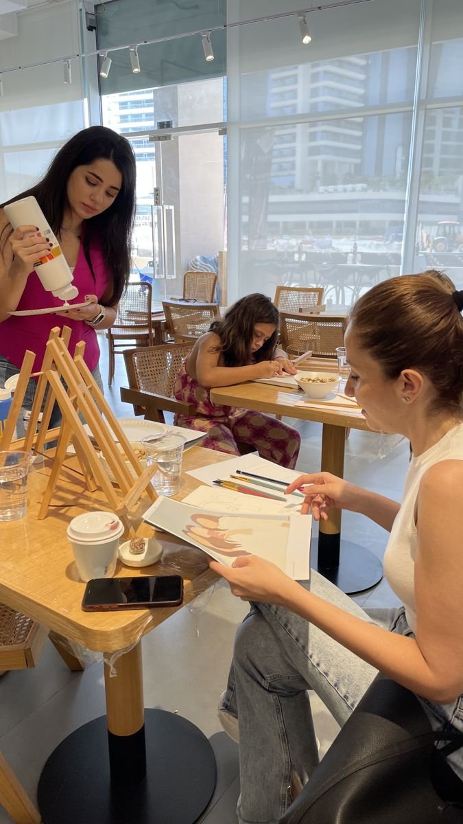 A painting session in a sunlit studio