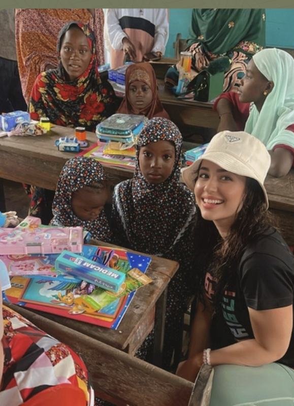 Senamees with children at an orphanage school in Zanzibar